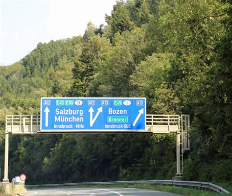 Traffic Signs With Directions To Cities And State Borders On The Stock