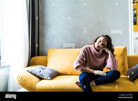Barefoot Girl Lying On Sofa Stockfotos Und Bilder Kaufen Alamy