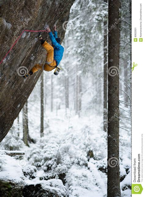 Rock Climber Professional Athlete Climbing In The Mountains Extreme