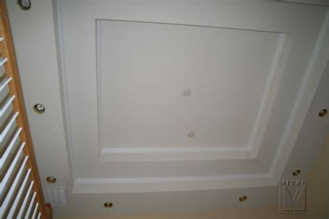My question is from the bottom of the tray to the top of. Ceiling Mouldings & Coffers - MITRE CONTRACTING, INC.