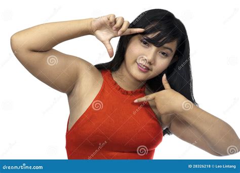 Chubby Girl Shows Something Interesting To Another Girl On Her Electronic Tablet Stock Image