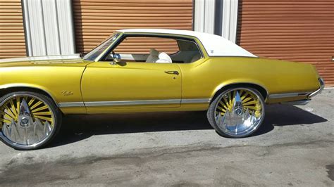 Gold 71 Cutlass On 26 Inch Dub Fu With White Interior Bucket Seats And