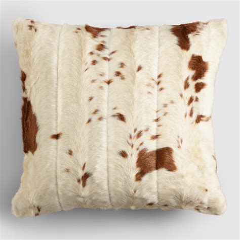 We offer 2 textile choices; Faux Cowhide Throw Pillow | World Market