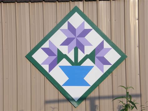 See more ideas about barn quilt, quilt patterns, barn quilt patterns. flower barn quilt … | Painted barn quilts, Barn quilt patterns, Barn quilt designs