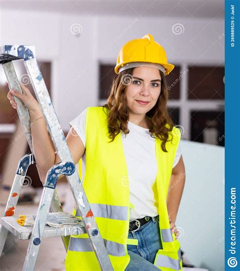 Woman Builder Sitting On Stepladder In Apartment Stock Image Image Of