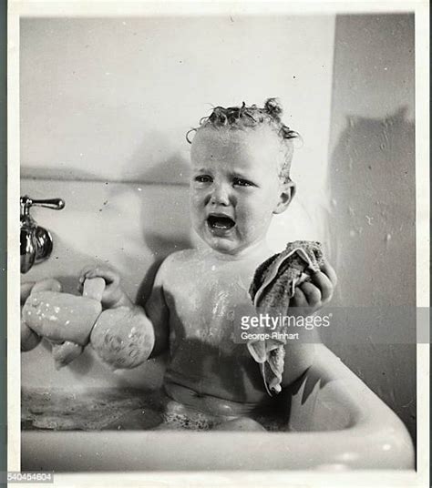 Baby Crying Bath Photos And Premium High Res Pictures Getty Images