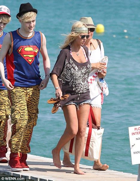 Tara Reid Looks On The Mend As She Bares Her Stomach In A Bikini With