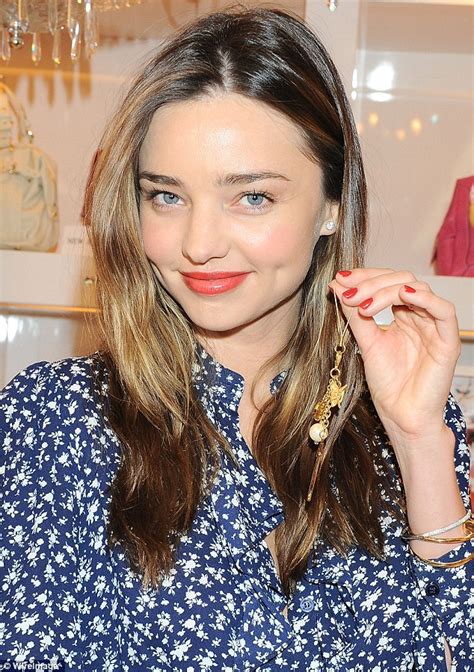 Miranda Kerr Opts For A Consciously Demure Look As Her