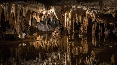 The Perfect Reflection Of Mirror Lake Inside Luray Caverns Virginia