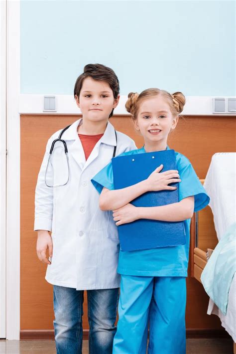 Boy Doctor With Stethoscope And Girl Nurse Free Stock Photo And Image