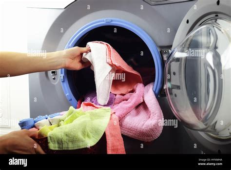 Machine Washer Hand Put Stock Photo Alamy