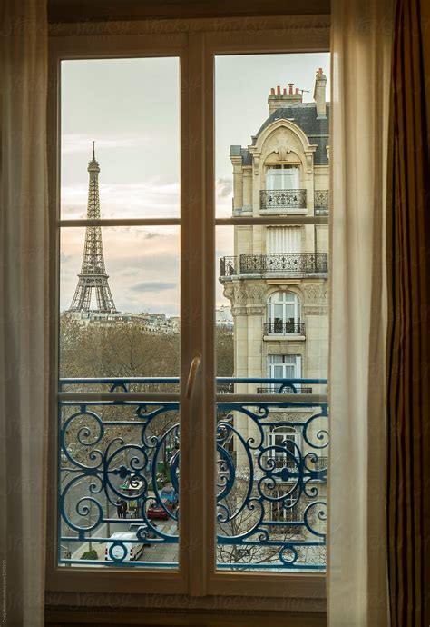 The Eiffel Tower Paris France Through An Apartment Window By