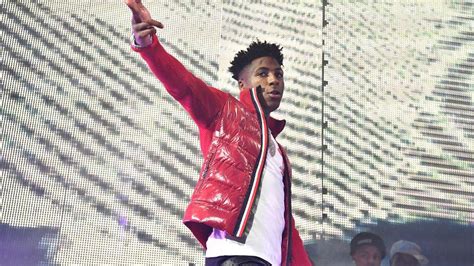 Nba Youngboy Is Wearing White T Shirt And Red Jacket Hd