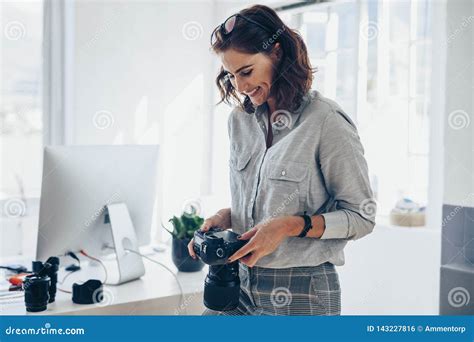 Female Photographer Working In Her Office Stock Photo Image Of