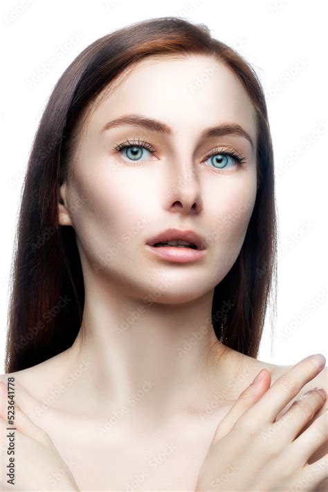 Beautiful Face Of Young Adult Woman With Clean Fresh Skin Natural Nude Makeup Blue Eyes White