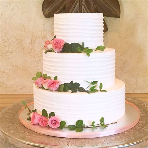 combed buttercream wedding cake with fresh flowers buttercream wedding cake fresh flower cake