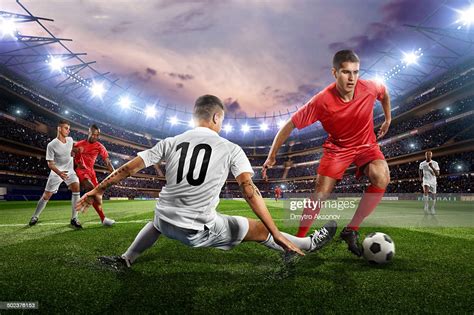 Soccer Players In Action On Soccer Stadium High-Res Stock Photo - Getty ...