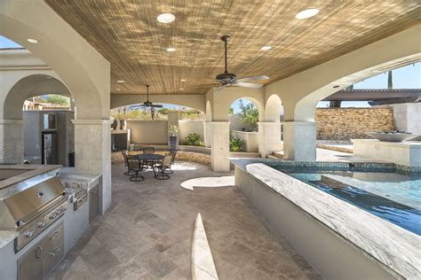 Vast Resort-Style Pool, Spanish Arches, Luxurious Outdoor Living in Me - Summerset Grills