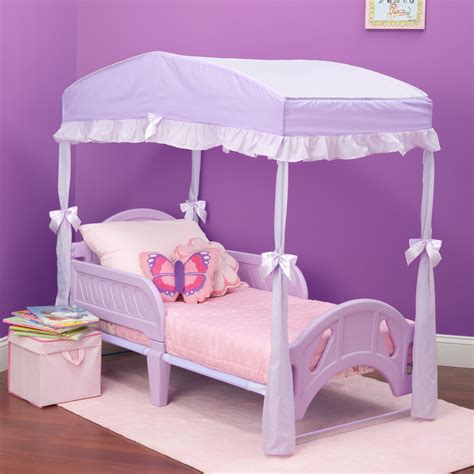 Install the first on the head of the bed and the second on the foot. Delta Children Children's Girls Canopy for Toddler Bed ...