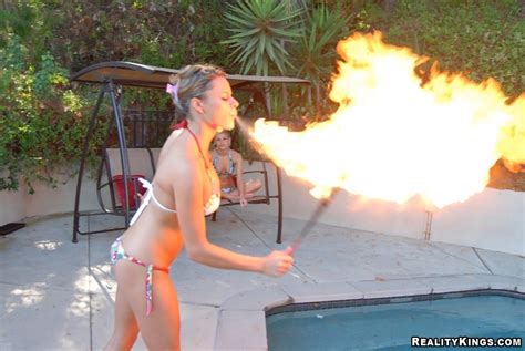 Amazing Bikini Babes Nikki And Shay Play By The Pool With Amazing Fire Breather Porn Pictures