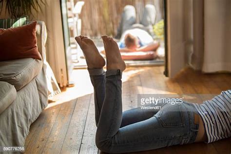 Barefoot Man Lying On Stomach Bildbanksfoton Och Bilder Getty Images