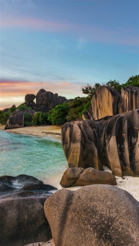Sunset Over Rocks At Beach Anse Source Dargent La Digue Island