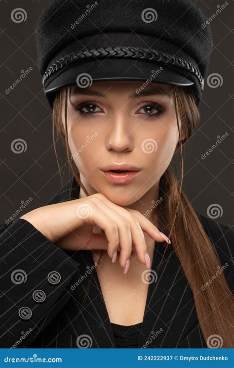 Portrait Of A Elegant Girl With Beautiful Makeup In A Beret And Suit