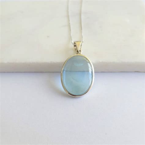 Blue Topaz Cabochon Necklace In Sterling Silver By Prisha Jewels