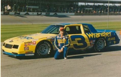 Dale Earnhardt Poses With His Wrangler Sponsored Chevrolet Monte Carlo