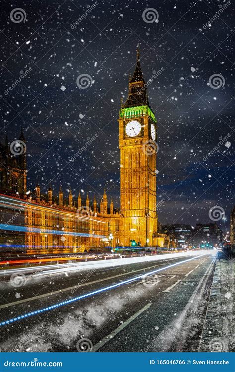 Big Ben Tower And Westminster Palace With Falling Snow London United