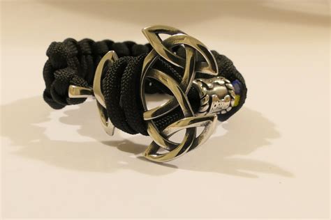 It's used primarily for its stylish look. This is a paracord bracelet I sell. The clasp on the bracelet is are Celtic knots. They ...