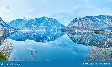 Dachstein Alps In Mirror Reflection Of Hallstattersee Lake