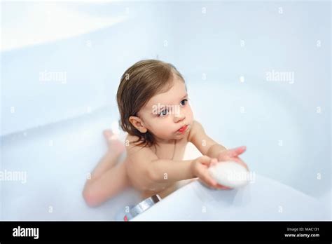 Girl With Soap In Bath Stock Photo Alamy