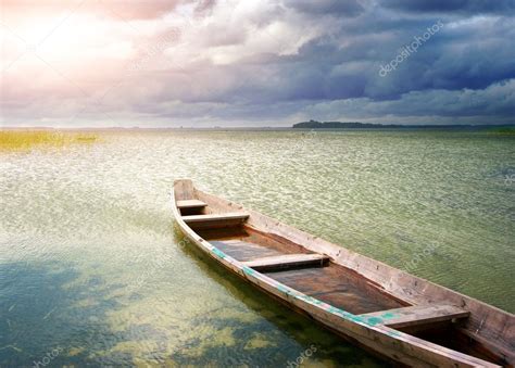Lonely Boat On Lake — Stock Photo © Zatvor 9842215