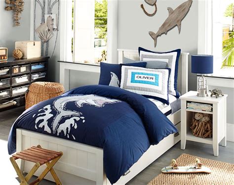 When designing a kids' theme room, it's best to keep strong design elements such as sharks, dinosaurs or pirates in a balanced proportion to create a cohesive design. Shark room. I love the dresser. Decorating Boys Room & Boy ...
