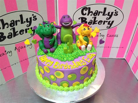 Barney Cake Toppers On Birthday Cake With Polka Dots A Photo On