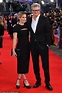 Colin Firth cosies up to girlfriend Maggie Cohn as they make their red ...