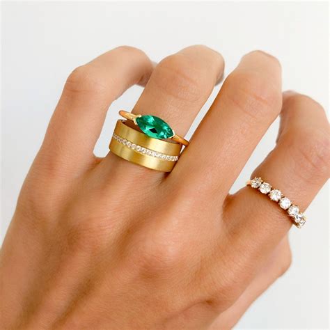 East West Half Bezel Solitaire Engagement Ring With Green Emerald