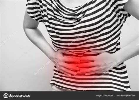 Young Woman Having Abdominal Pain Upset Stomach Or Menstrual Cramps ⬇