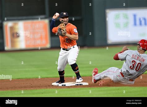 Houston Astros Second Baseman Jose Altuve 27 Turns A Double Play