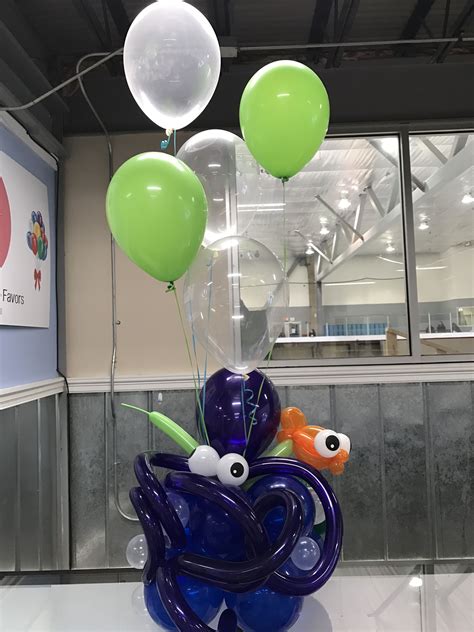 We create beautiful balloon decorations, including arches, columns, centerpieces, topiaries, swags, canopies and we deliver a vast array of balloon bouquets and arrangements. Under the sea theme balloon decor #balloons #raleighnc # ...