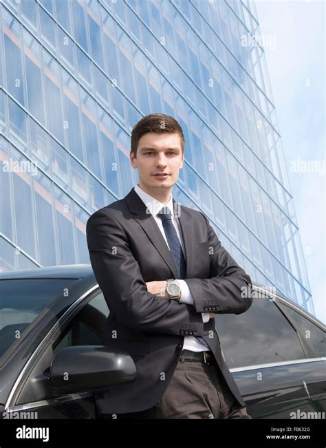 Young Businessman Standing Near His Car Stock Photo Alamy