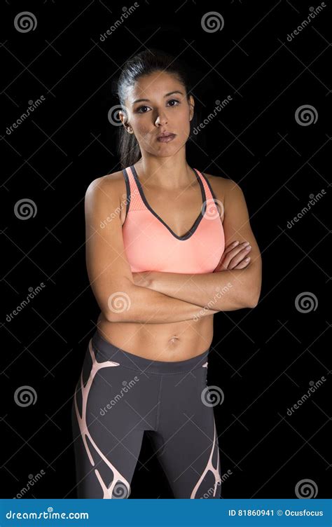 Latin Sport Woman Posing In Fierce And Badass Face Expression With Fit