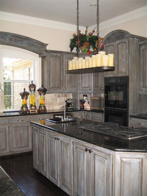 Glaze Added A Touch Of Blue To These Gray Stained Cabinets For A Fresh