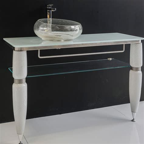 The tavian double sink bathroom vanity is designed with a sleek, clean, and modern style. MURANO GLASS VANITY 47" | WHITE