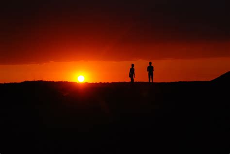 Couple Silhouettes At Sunset Free Image Download