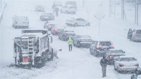Winter Storm Dumps Heavy Snow Along East Coast Snarling Travel And