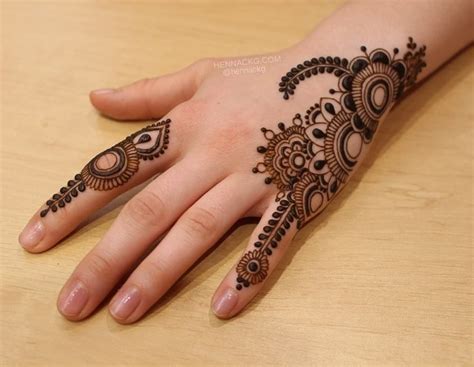 Tangling Finger Arabic Mehndi Designs For Full Forehand Finger Zohal