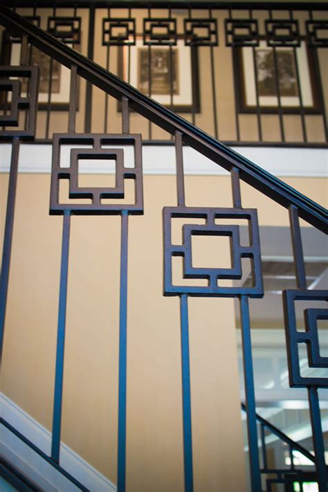 This contemporary design is one of the modern stair railing ideas that can be incorporated in homes with larger spaces. Modern Railing Design - Southern Staircase | Artistic Stairs