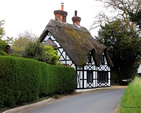 This Charming Thatched Cottage Is Located On A Back Lane In The